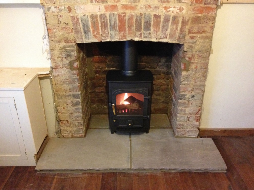 Clearview Pioneer 400 with bare brick chimney Log Burner Installation